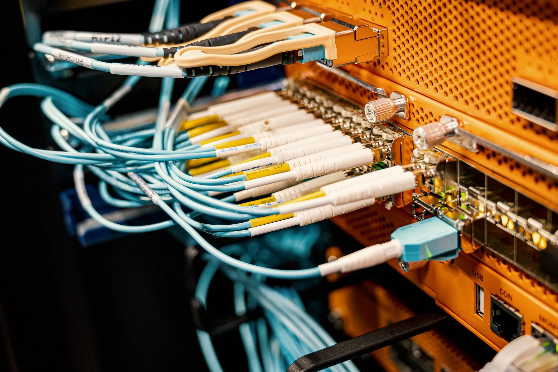 Fibre optic patch cables connected to a network cabinet