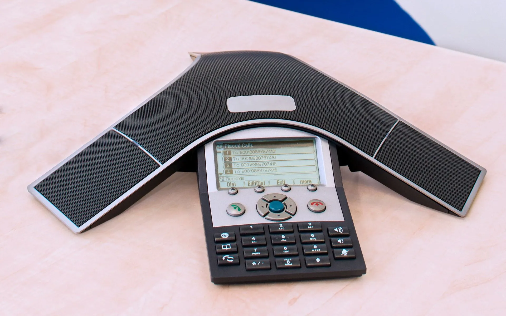 Business IP conference phone on an office desk